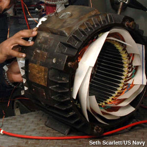 The inside of an AC induction motor being rewound.