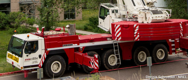 The chassis section of a typical Liebherr hydraulic truck crane, showing the large rear counterweights