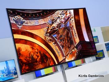 Ultra-thin, curved-screen Samsung OLED TV.