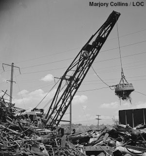 Scrapyard electromagnet, black and white, by Marjory Collins.