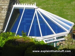 Blue, self-cleaning, heat-reflecting glass keeps a conservatory cool.