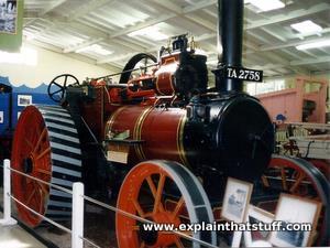 A steam traction engine in a museum