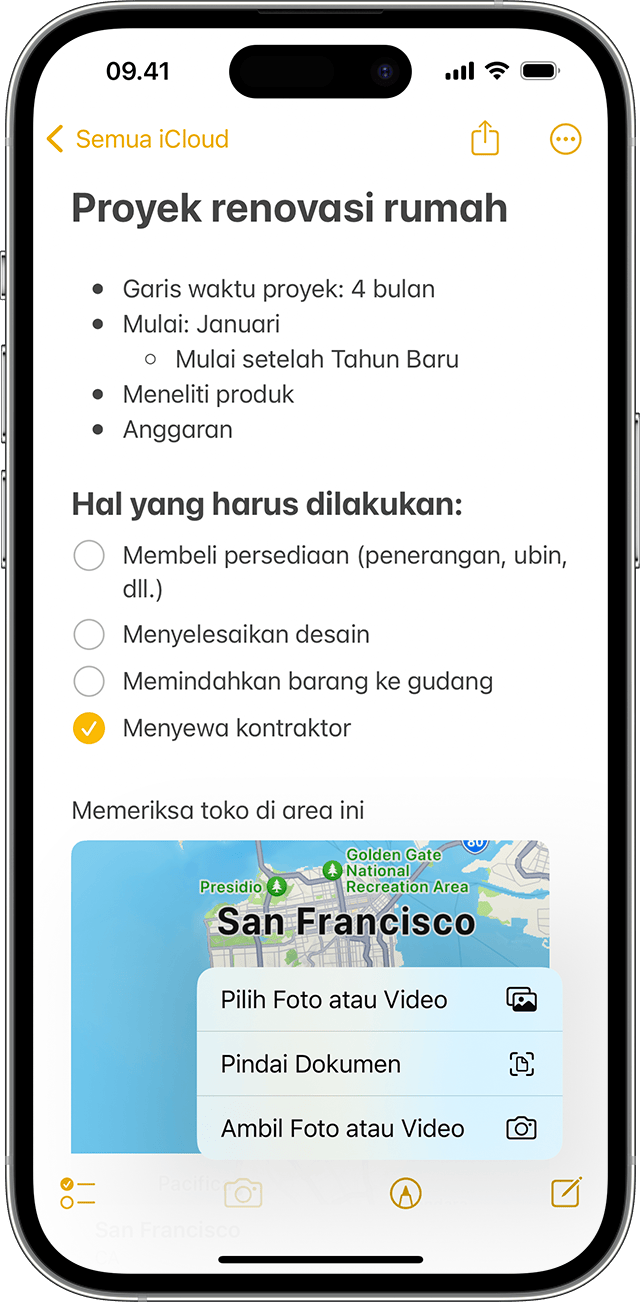 iPhone menunjukkan cara menambahkan foto atau video ke catatan di app Catatan.