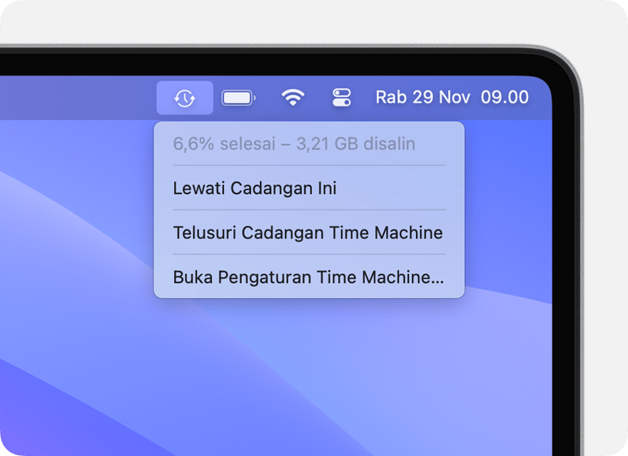 Menu Time Machine menampilkan pencadangan yang sedang berlangsung