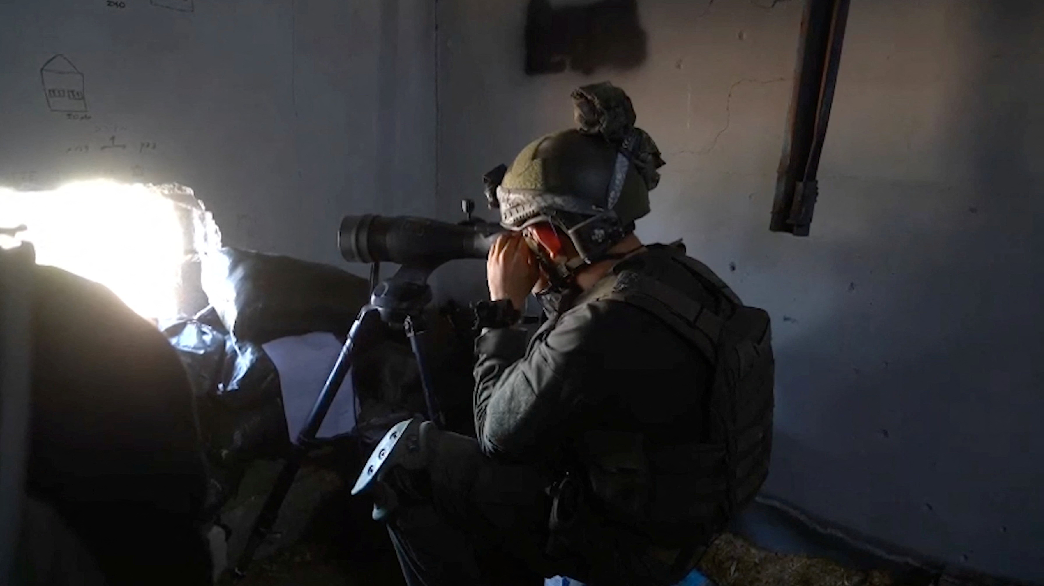 Member of the Israeli army operates in a location given as Gaza