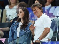 PARIS, FRANCE - JULY 28: Tom Cruise (R) waves during the Artistic Gymnastics Women's Qualification on day two of the Olympic Games Paris 2024 at Bercy Arena on July 28, 2024 in Paris, France. (Photo by Arturo Holmes/Getty Images)