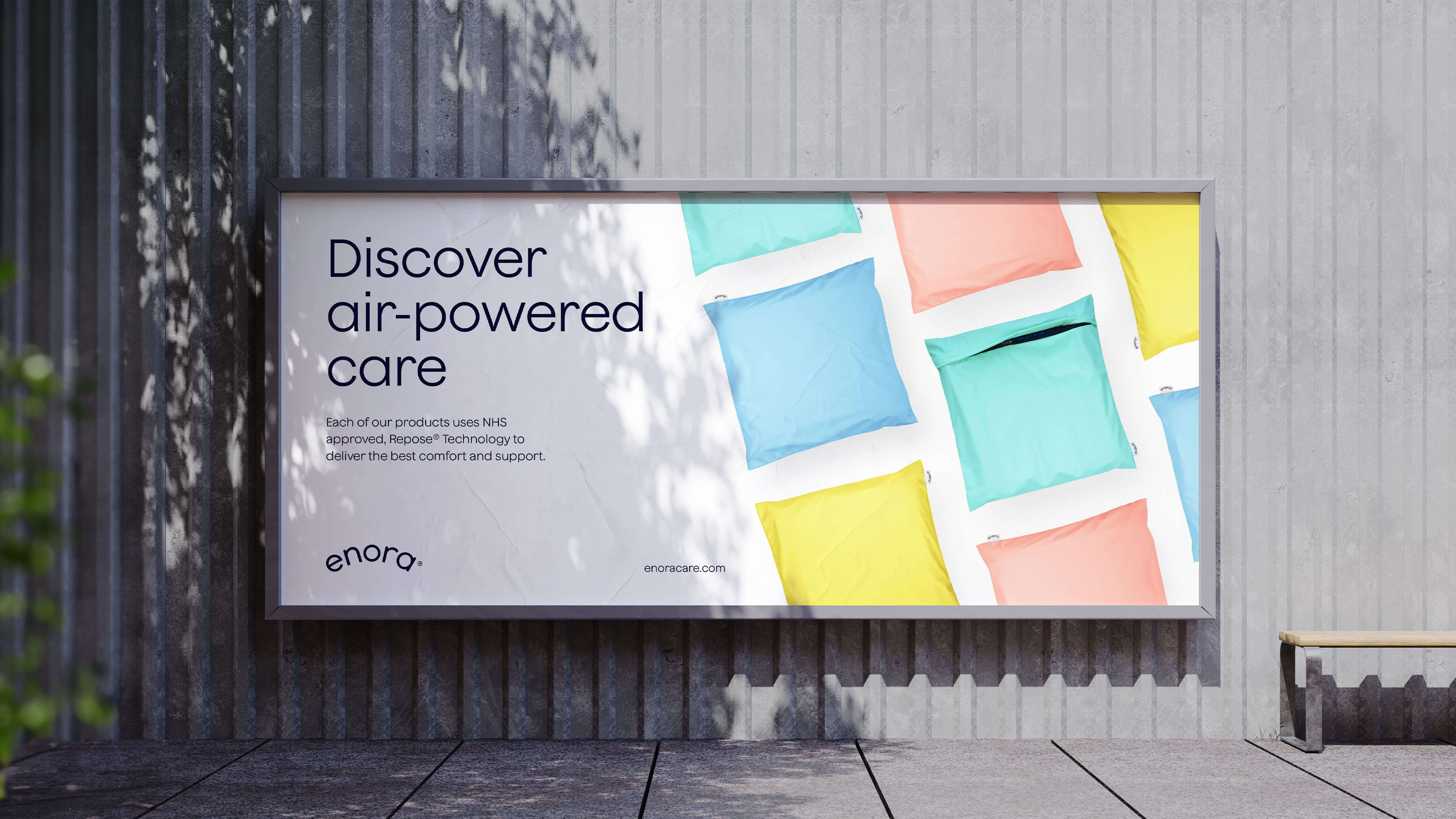 a billboard showcasing the enora air cushion, reading 'discover air-powered care'