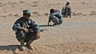 Afghan National Police officers in the desert | Chuck Liddy/MCT/Newscom