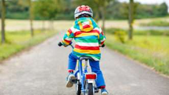 Bike ride | Kid Bike © Romrodinka | Dreamstime.com