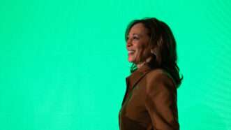 Kamala Harris standing in front of a green backdrop. | Annabelle Gordon/Sipa USA/Newscom