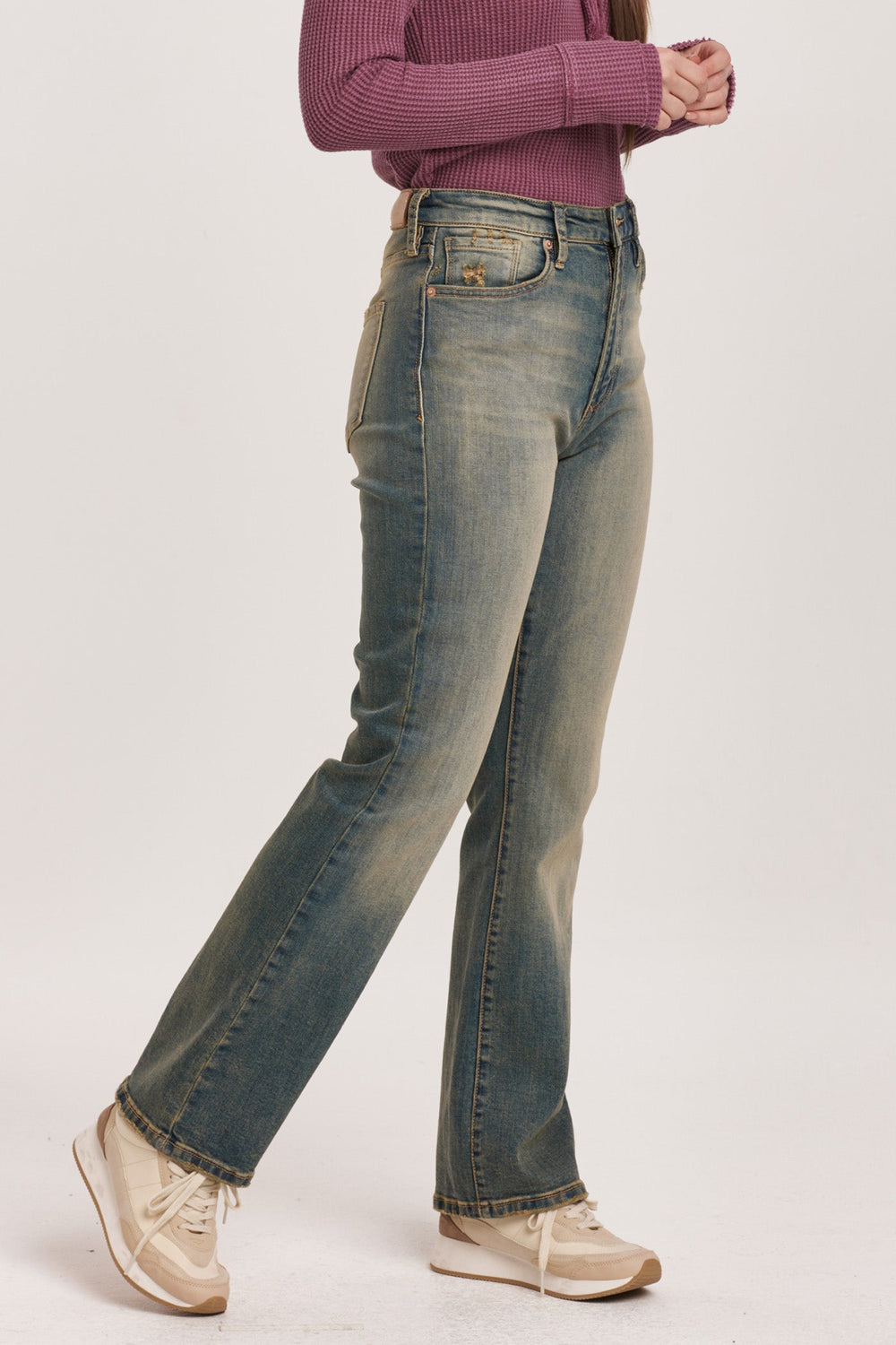 image of a female model wearing a PARIS BOOTCUT FIT SUPER HIGH RISE JEAN WRATH DEAR JOHN DENIM 