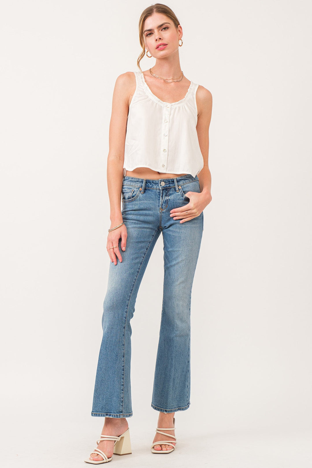 image of a female model wearing a ROSIE LOW RISE FLARE JEANS COLLISTER DEAR JOHN DENIM 