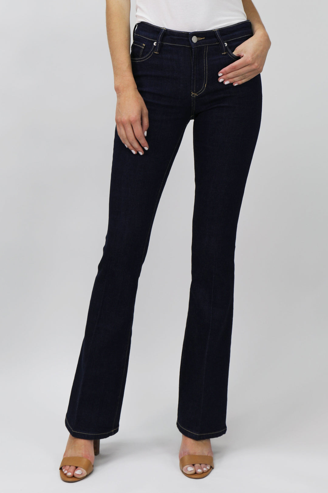 image of a female model wearing a ROSA HIGH RISE FLARE JEANS BREAKWATER DEAR JOHN DENIM 