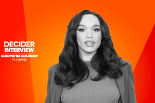 Cleopatra Coleman in black and white on a bright orange background