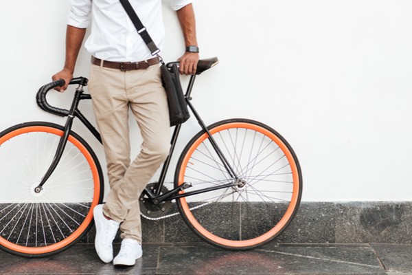 Man in front of a bicycle