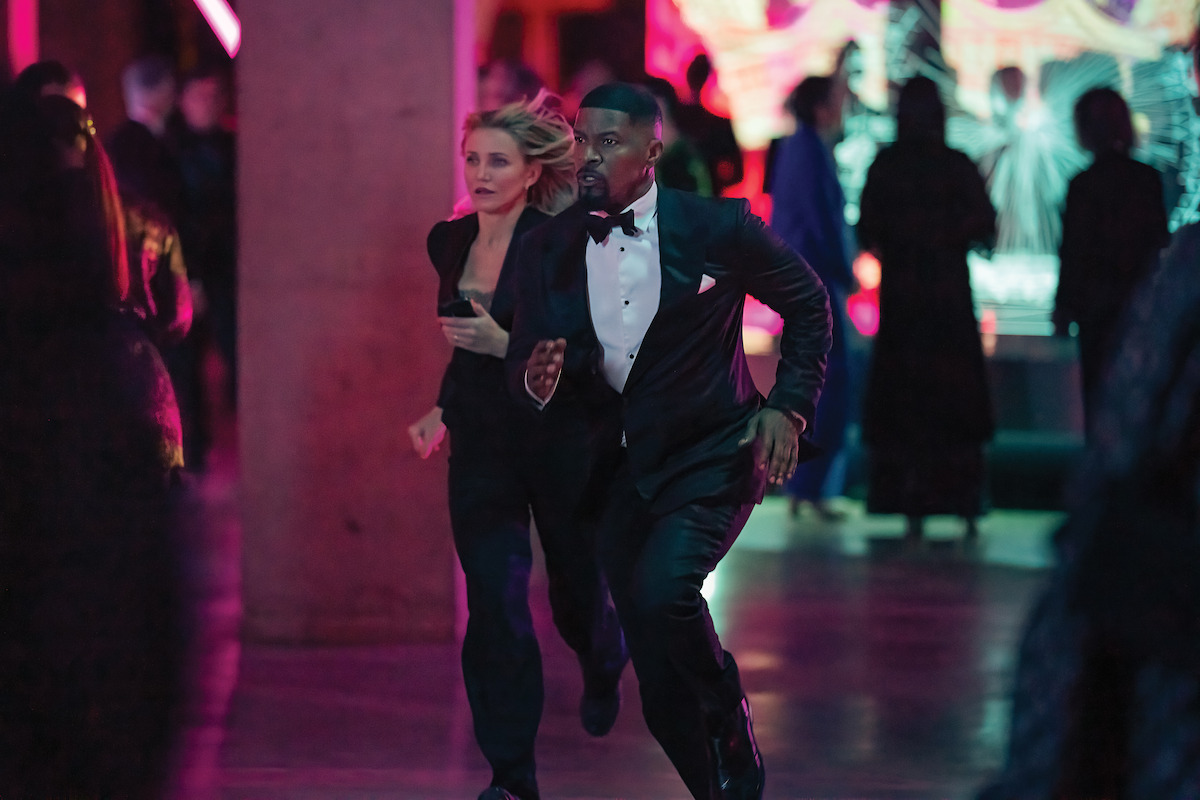 Cameron Diaz as Emily and Jamie Foxx as Matt run in ‘Back In Action.’