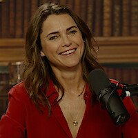 Actor Keri Russell with a microphone.