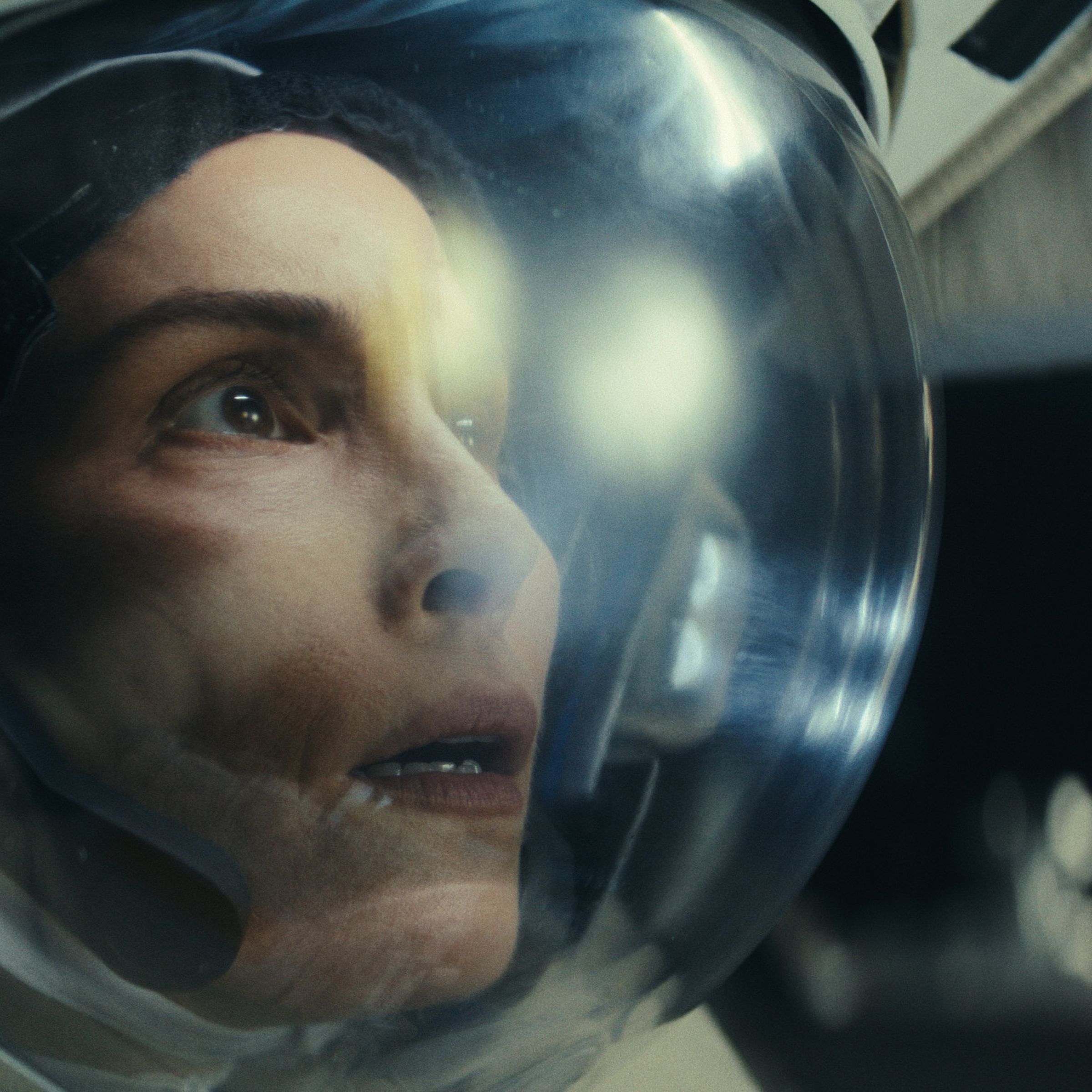 Picture of Noomi Rapace wearing an astronaut’s helmet, looking at something anxiously&nbsp;in a scene from the sci-fi TV series Constellation.