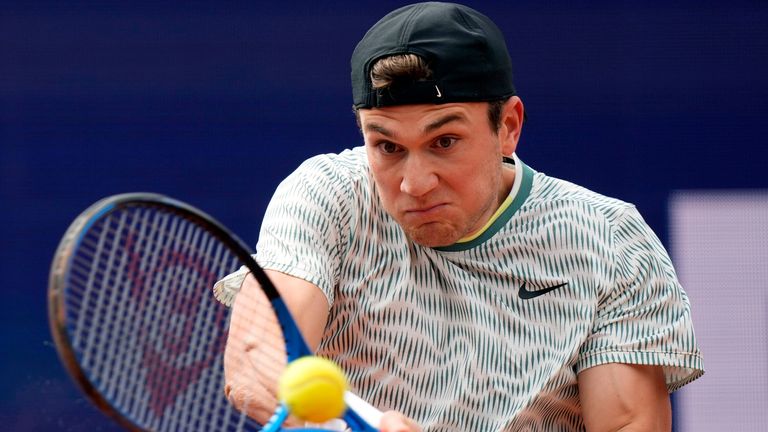 Jack Draper of Britain returns the ball during the quarter final match against Taylor Fritz of the United States at the Tennis ATP tournament in Munich, Germany, Friday, April 19, 2024. (AP Photo/Matthias Schrader)