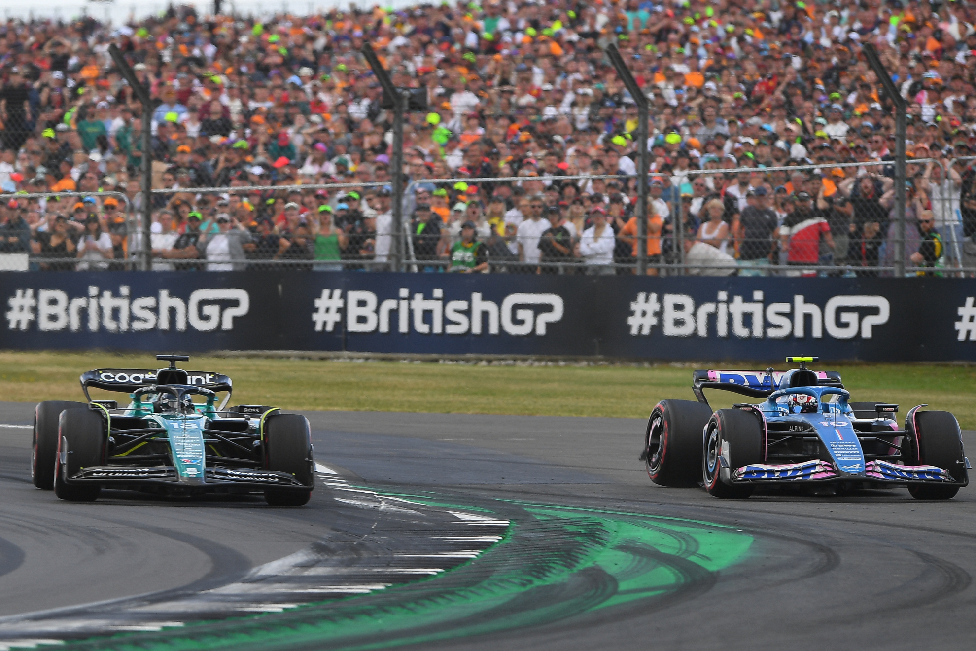 Stroll y Gasly, durante el GP de Gran Breta�a.