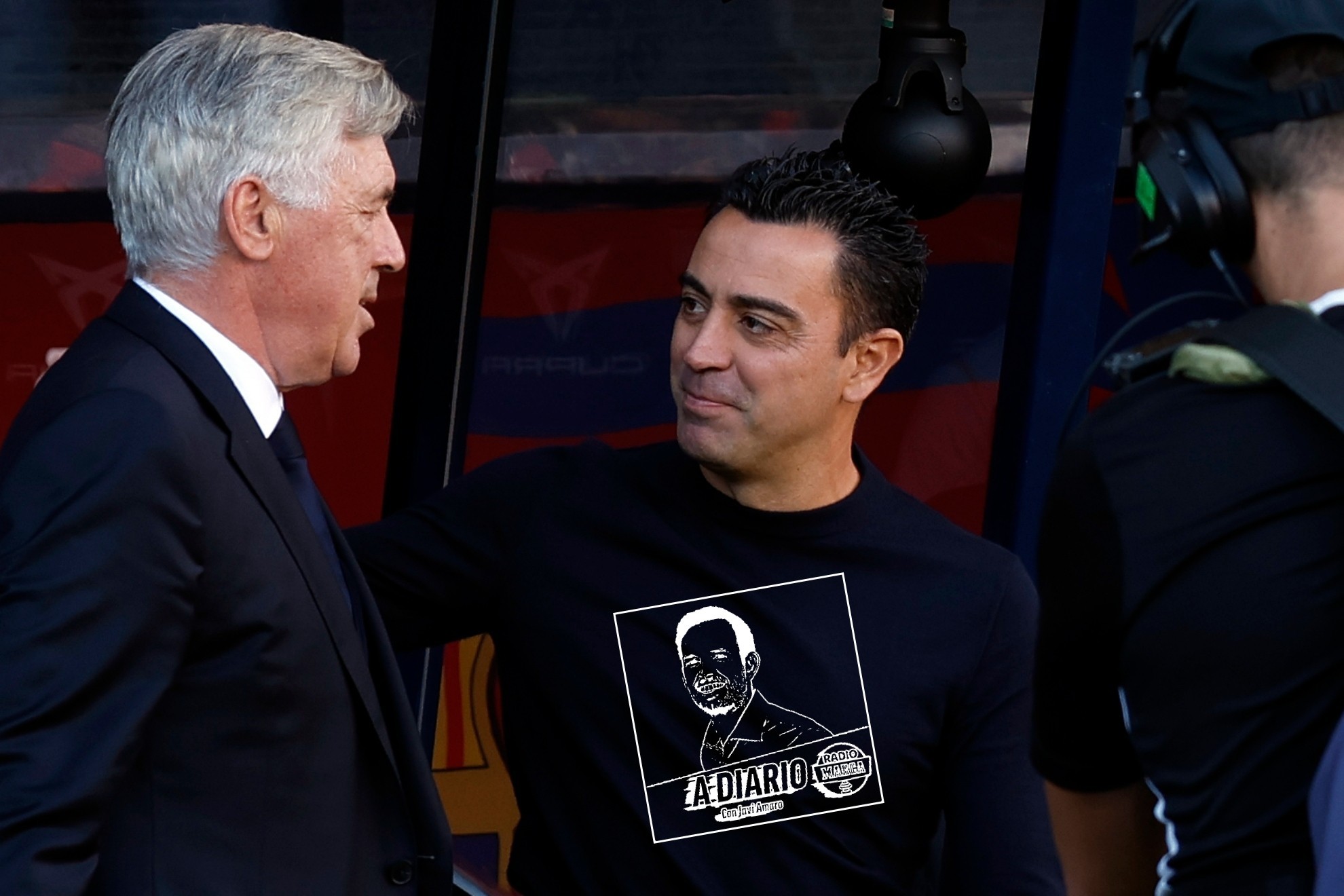 Xavi y Ancelotti, antes del Real Madrid-Barcelona.