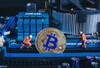 Two miners and Bitcoin on a mother board