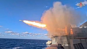 In this photo taken from video distributed by Russian Defense Ministry Press Service on Sunday, Oct. 13, 2024, A Russian warship fires a missile during joint drills held by the Russian and Chinese navies.