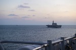 EAST CHINA SEA (Nov. 03, 2021) The forward-deployed amphibious assault ship USS America (LHA 6) steams along with the Japan Maritime Self-Defense Force ship JS Ise (DDH 118) during a formation exercise.