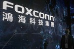 The Foxconn logo is seen during the Hon Hai Tech Day at the Nangang Exhibition Center in Taipei, Taiwan, on Oct. 18, 2022