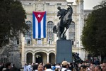 People attend a ceremony of unveiled a replica of a New York statue of Cuba's independence hero Jose Marti  in Havana, Cuba