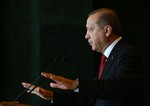 Turkey's President Recep Tayyip Erdogan addresses a meeting of Turkish ambassadors in Ankara, Turkey, Tuesday, Jan. 12, 2016.