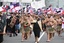 Indigenous Māori people walk through the streets of Wellington, New Zealand to protest against a proposed law that would redefine the country's founding agreement between Indigenous Māori and the British Crown, Tuesday, Nov. 19, 2024.