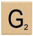 a wooden block with the letter g on it