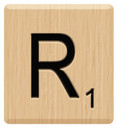 a wooden block with the letter r on it