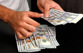 La divisa estadounidense cerró $4.184 en Colombia. FOTO COLPRENSA 