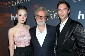 LOS ANGELES, CALIFORNIA - NOVEMBER 14: (L-R) Elle Fanning, Tony McNamara, and Nicholas Hoult attend the premiere of Hulu's "The Great" at Sunset Room Hollywood on November 14, 2021 in Los Angeles, California. (Photo by Phillip Faraone/Getty Images)