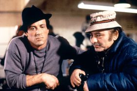 American actor Burt Young with actor and screenwriter Sylvester Stallone on the set of Rocky V directed by John G. Avildsen. (Photo by Sunset Boulevard/Corbis via Getty Images)