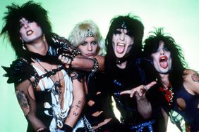 (L-R) Bassist Nikki Sixx, lead singer Vince Neil, lead guitarist Mick Mars and drummer Tommy Lee of the American hard rock band Motley Crue pose for a studio portrait during Ozzy Osbourne's Bark at the Moon Tour on March 6, 1984, at Joe Louis Arena in Detroit, Michigan