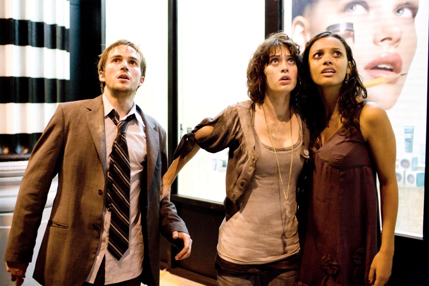 Michael Stahl-David, Lizzy Caplan, and Jessica Lucas in 'Cloverfield'
