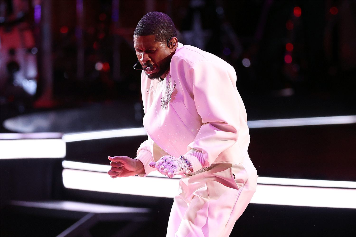 Singer Usher performs on the field during the Apple Music Super Bowl LVIII Halftime Show at Allegiant Stadium on February 11, 2024 in Las Vegas, Nevada.