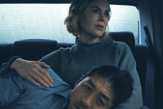 Expats Clarke (Brian Tee), Margaret (Nicole Kidman)