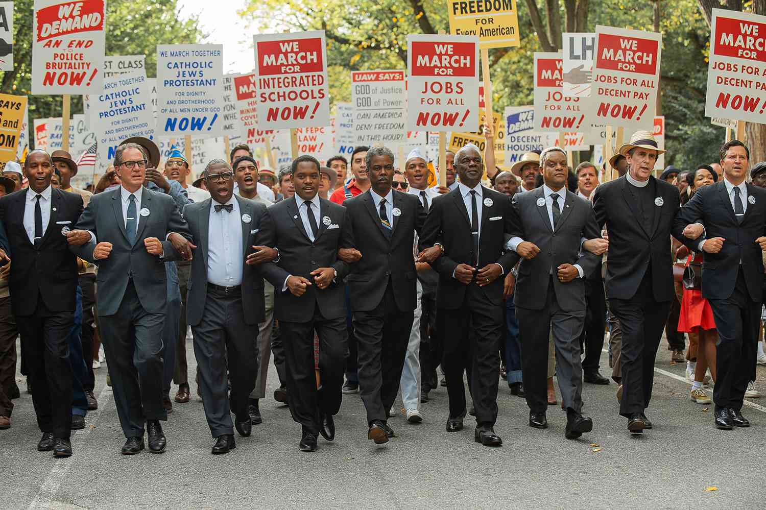 Rustin. (L to R) Michael Potts as Cleve Robinson, Aml Ameen as Martin Luther King, Chris Rock as NAACP Exec. Dir. Roy Wilkins and Glynn Turman as A Philip Randolph in Rustin. Cr. David Lee/Netflix © 2022