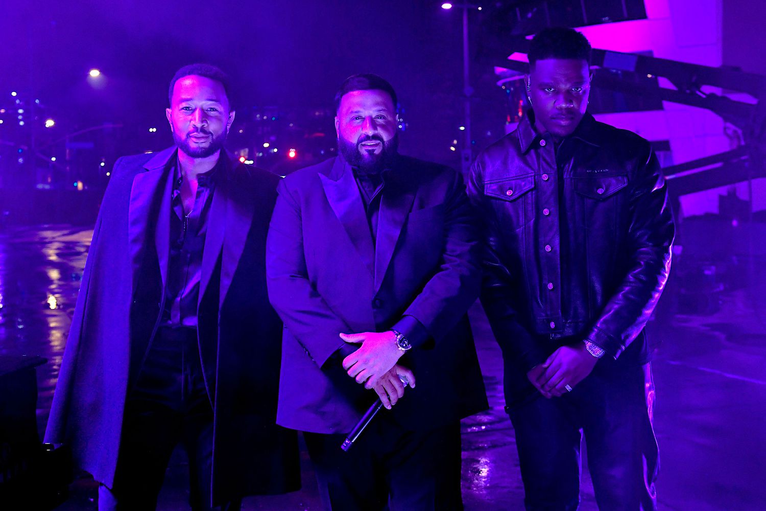 John Legend, DJ Khaled and Fridayy pose during performs onstage during the 65th GRAMMY Awards at Crypto.com Arena in Los Angeles, California.