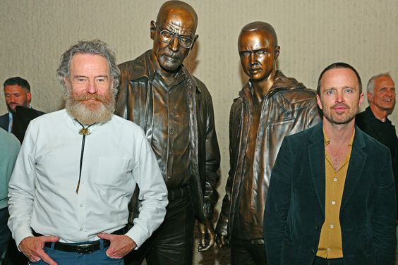 ALBUQUERQUE, NEW MEXICO - JULY 29: Actor Bryan Cranston (L) and actor Aaron Paul pose with bronze statues depicting television characters Walter White, played by Cranston, and Jesse Pinkman, played by Paul, from the series "Breaking Bad" at the Albuquerque Convention Center on July 29, 2022 in Albuquerque, New Mexico. The statues were commissioned in 2019 by Sony Pictures Television and were sculpted by artist Trevor Grove and cast by Burbank, California-based American Fine Arts Foundry. (Photo by Sam Wasson/Getty Images)