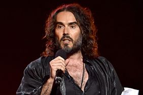 LOS ANGELES, CALIFORNIA - JANUARY 24: Russell Brand speaks onstage during MusiCares Person of the Year honoring Aerosmith at West Hall at Los Angeles Convention Center on January 24, 2020 in Los Angeles, California. (Photo by Lester Cohen/Getty Images for The Recording Academy )