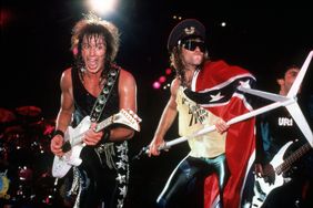 Lead guitarist Richie Sambora and lead vocalist and band namesake Jon Bon Jovi perform on June 22, 1985, at Hart Plaza in Detroit, MI.
