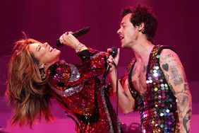 Shania Twain and Harry Styles perform onstage at the Coachella Stage during the 2022 Coachella Valley Music And Arts Festival on April 15, 2022 in Indio, California. 