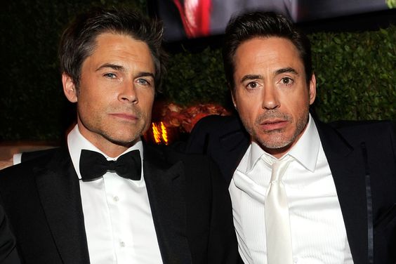 Rob Lowe and Robert Downey Jr attend the 2011 Vanity Fair Oscar Party Hosted by Graydon Carter at the Sunset Tower Hotel on February 27, 2011 in West Hollywood, California.