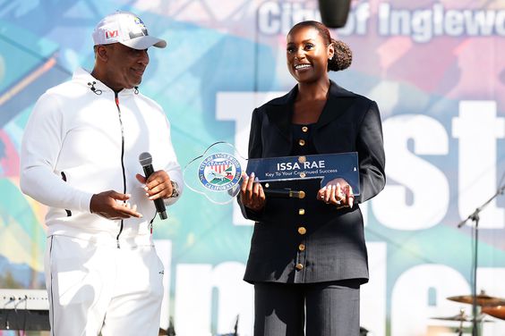 Inglewood Mayor James Butts presents Issa Rae with first ever Ci ty of Inglewood key to the city on stage during the Taste Of Inglewood Experience presents Market Street Vibez Pre-Game Extravaganza on February 12, 2022 in Inglewood, California.