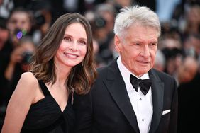 CANNES, FRANCE - MAY 18: Calista Flockhart and Harrison Ford attend the "Indiana Jones And The Dial Of Destiny" red carpet during the 76th annual Cannes film festival at Palais des Festivals on May 18, 2023 in Cannes, France